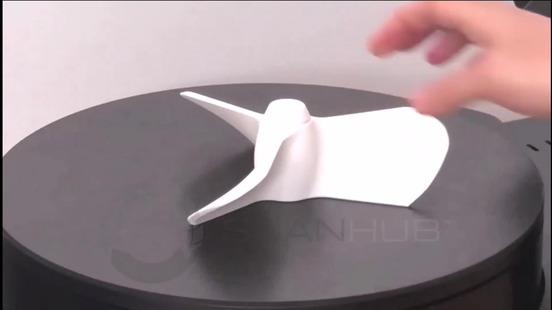 A part on the ScanHub kiosk turntable